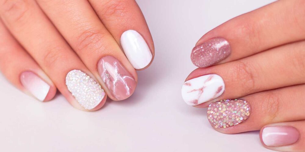 Pink nail polish on beautiful hands
